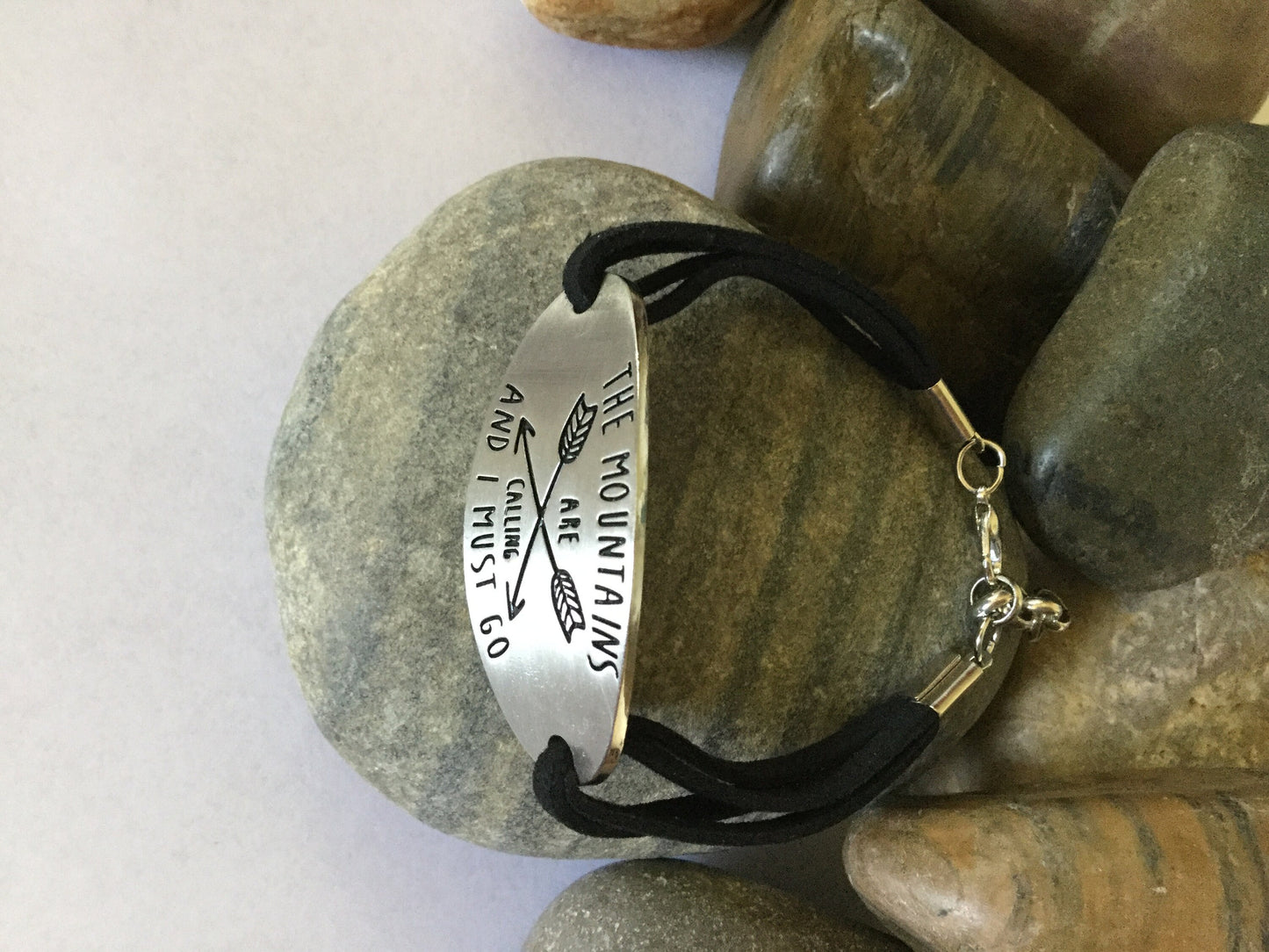 The Mountains Are Calling & I Must Go, Black Suede Inspirational Quoted Bracelet.