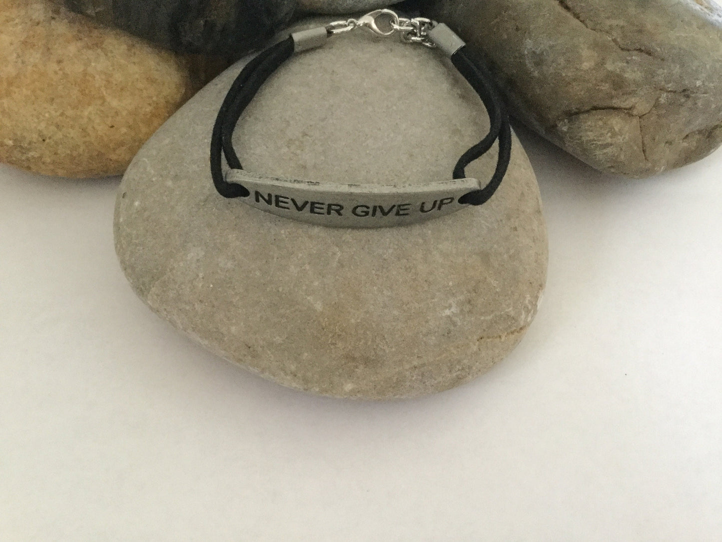 Never Give Up, Black Suede Metal Inspirational Quoted Bracelet.