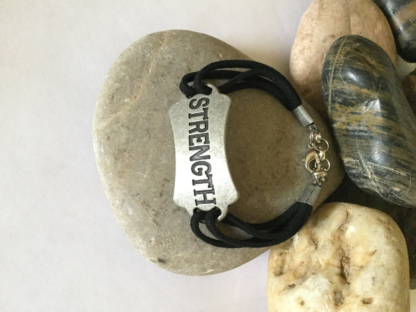 Strength, Black Suede Corded Metal Inspirational Quote Bracelet.