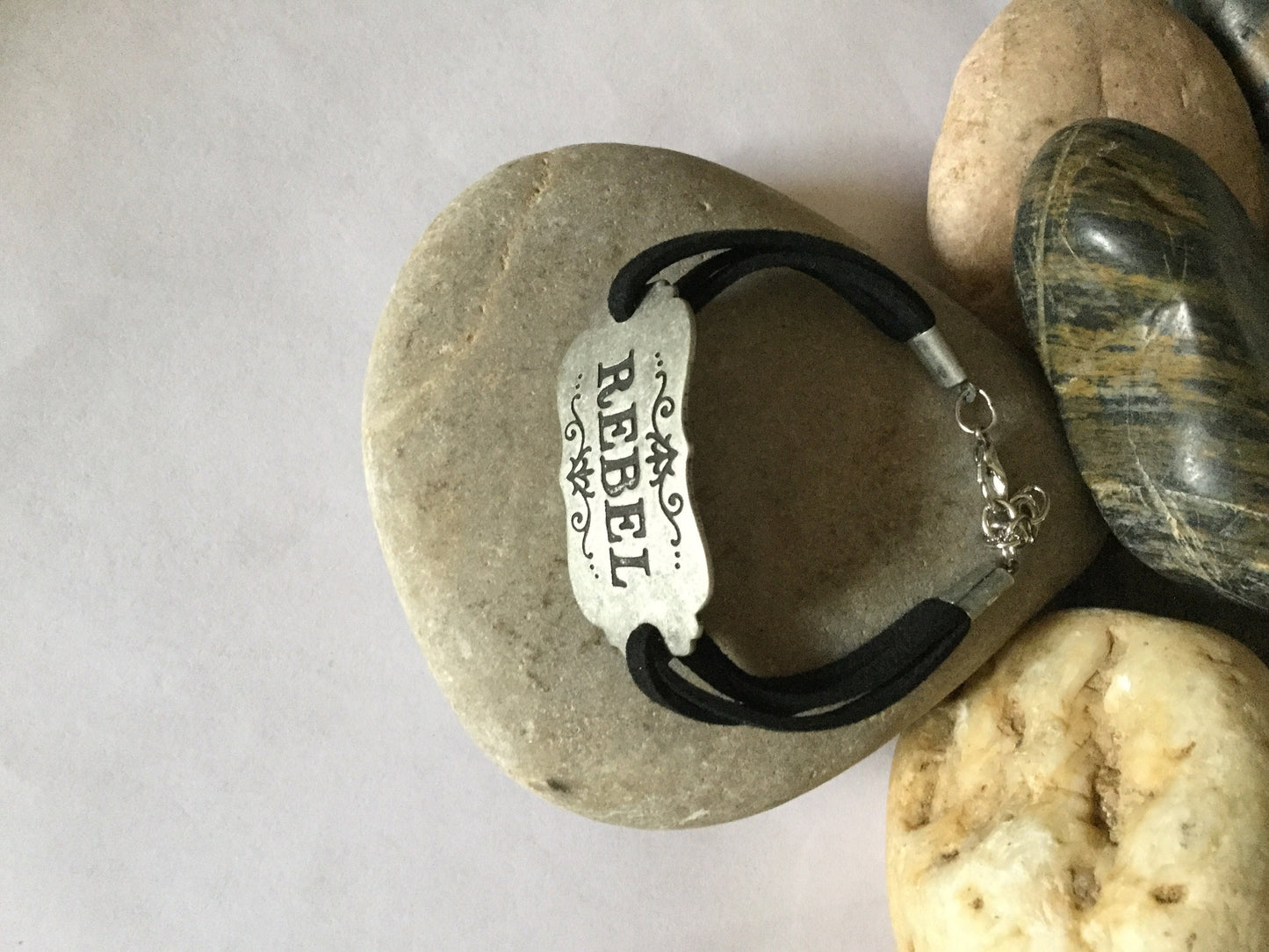 Rebel, Black Suede Metal Inspirational Quoted Bracelet.