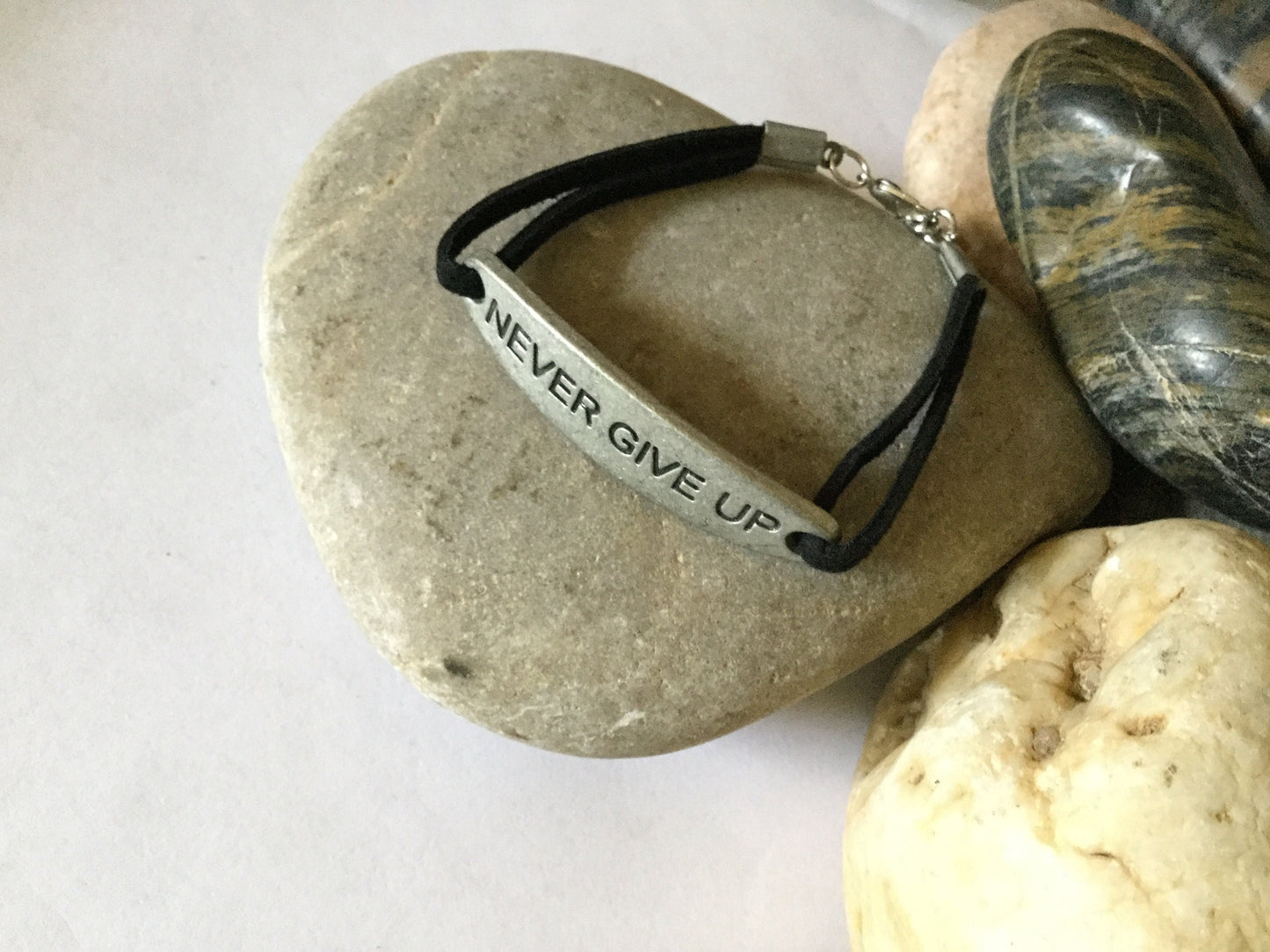 Never Give Up, Black Suede Metal Inspirational Quoted Bracelet.