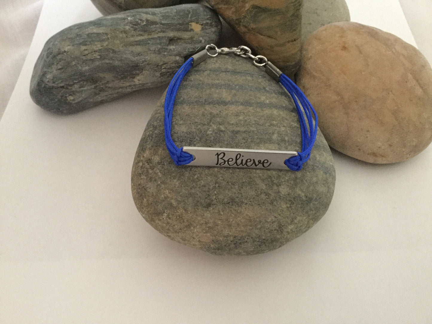 Believe, Silver Metal Inspirational Quoted Bracelet.