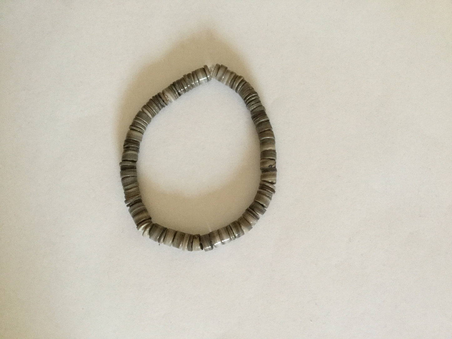Shell,  “Disk Grey” Healing Bracelet.