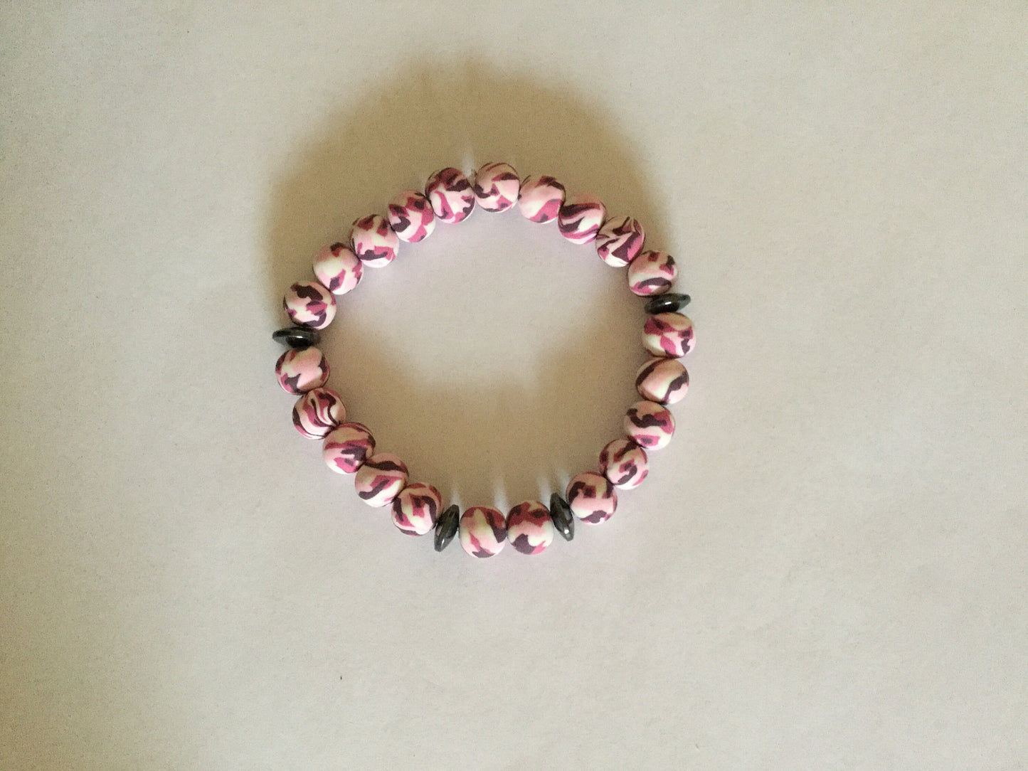 Clay, Pink Camouflage w/Hematite Stones Healing Bracelet.