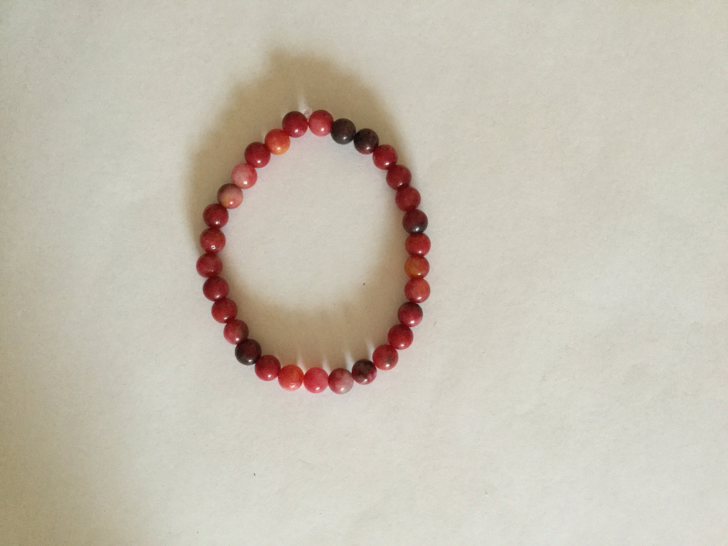 Jade  “Reddish”Stones, Healing Bracelet.